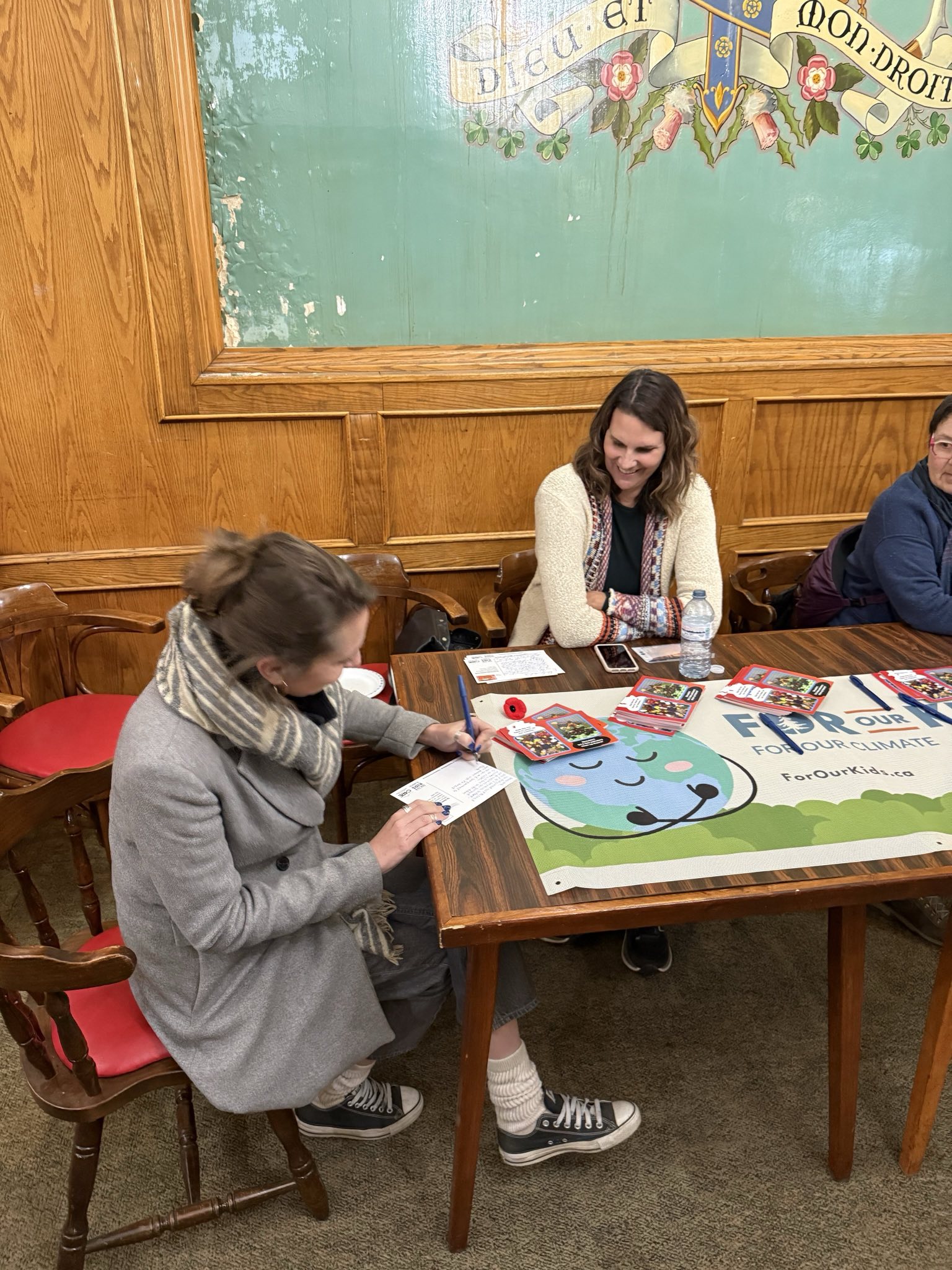 Calgarians engaging with Alberta Environment Network organizers at information table